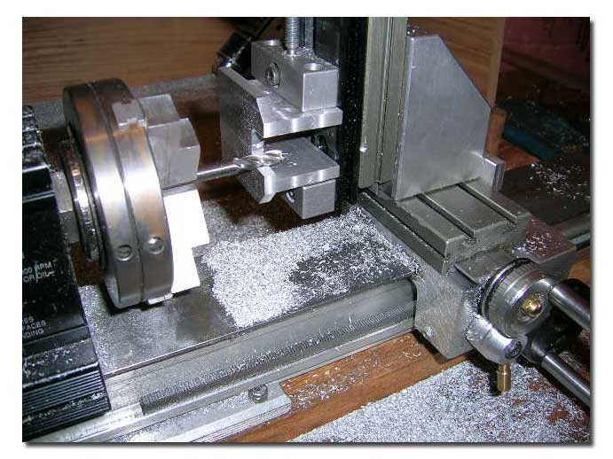 Milling the opening for the stuffing tube. Milling the opening for the stuffing tube.